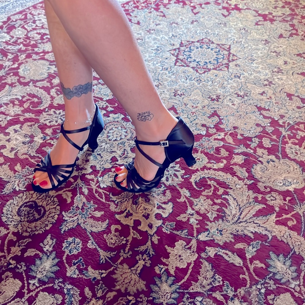 Beautiful black heels with diamonds buckle!! NWT. And never worn!